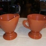 Hazel Atlas Moderntone Ovid Platonite Rust Orange Creamer and Sugar